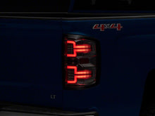 Load image into Gallery viewer, Raxiom 14-18 Chevrolet Silverado 1500 LED Tail Lights/SeqTurn Signals- Chrome- Smoked Lens