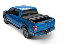 Load image into Gallery viewer, Lund 04-17 Nissan Titan (5.5ft. Bed w/o Titan Box) Genesis Elite Tri-Fold Tonneau Cover - Black