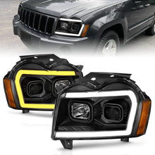 Cargar imagen en el visor de la galería, ANZO 2005-2007 Jeep Grand Cherokee Projector Headlights w/ Light Bar Switchback Black Housing