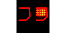 Load image into Gallery viewer, Raxiom 07-13 Toyota Tundra Axial Series Dual C-Shape LED Tail Lights- Black Housing- Smoked Lens