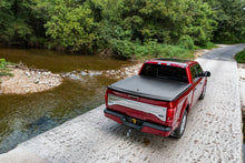 Cargar imagen en el visor de la galería, UnderCover 09-14 Ford F-150 5.5ft SE Bed Cover - Black Textured