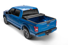 Load image into Gallery viewer, Lund 04-17 Nissan Titan (5.5ft. Bed w/o Titan Box) Genesis Elite Tri-Fold Tonneau Cover - Black