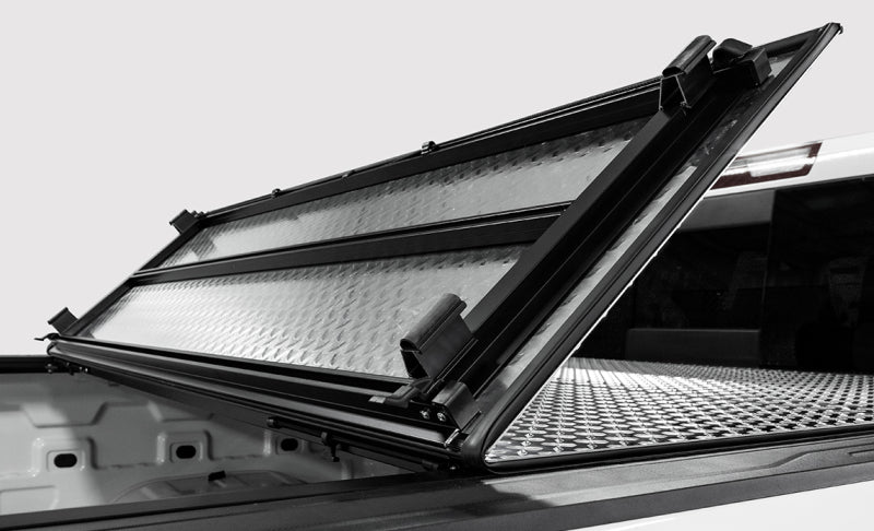 Access 02-18 Ram 1500/03-18 Ram 2500/3500 6ft 4in Bed LOMAX Tri-Fold Cover - Urethane Diamond Plate