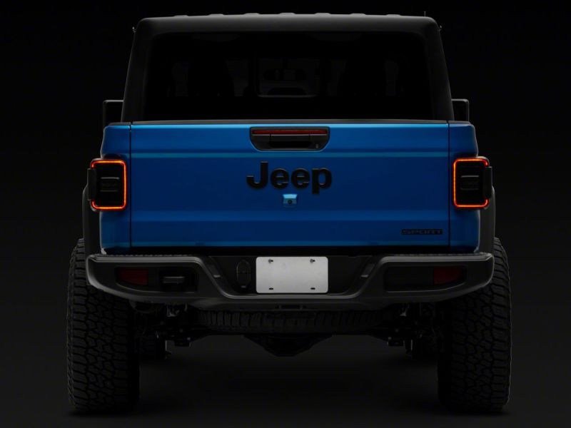 Raxiom 20-23 Jeep Gladiator JT w/ Factory Halogen LED Tail Lights- Black Housing (Smoked Lens)