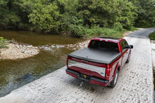 Cargar imagen en el visor de la galería, UnderCover 16-20 Nissan Titan 6.5ft SE Bed Cover - Black Textured