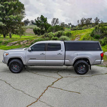 Load image into Gallery viewer, Westin EXP Truck Cap COMPLETE KIT A + BS (16-23 Toyota Tacoma 6ft. Bed)