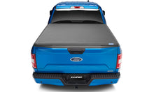 Cargar imagen en el visor de la galería, Lund 04-17 Nissan Titan (5.5ft. Bed w/o Titan Box) Genesis Elite Tri-Fold Tonneau Cover - Black