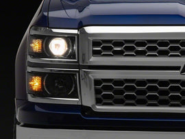 Raxiom 14-15 Chevrolet Silverado 1500 OE Projector Headlights/Chrome Trim- Black- Clear Lens