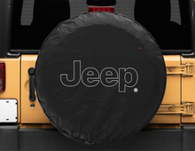 Load image into Gallery viewer, Officially Licensed Jeep 66-18 CJ5/ CJ7/ Wrangler YJ/ TJ/JK Outline Logo Spare Tire Cover- 31Inch