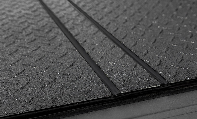 Access 02-18 Ram 1500/03-18 Ram 2500/3500 6ft 4in Bed LOMAX Tri-Fold Cover - Urethane Diamond Plate