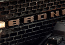 Cargar imagen en el visor de la galería, Ford Racing 2021+ Bronco Grille Lettering Overlay Kit - Bronze