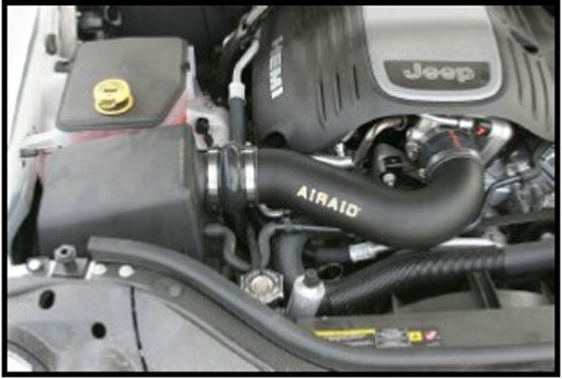 Airaid 05-10 Jeep Grand Cherokee 5.7L Hemi Airaid Jr Intake Kit - Dry / Red Media