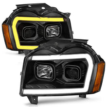 Cargar imagen en el visor de la galería, ANZO 2005-2007 Jeep Grand Cherokee Projector Headlights w/ Light Bar Switchback Black Housing