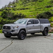 Load image into Gallery viewer, Westin EXP Truck Cap COMPLETE KIT A + BS (16-23 Toyota Tacoma 6ft. Bed)