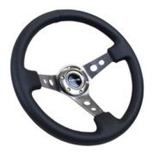 Cargar imagen en el visor de la galería, NRG Reinforced Steering Wheel (350mm / 3in. Deep) Blk Leather w/Gunmetal Circle Cutout Spokes