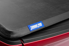 Cargar imagen en el visor de la galería, Tonno Pro 04-15 Nissan Titan 6.7ft (Incl 42-498 Utility Track Kit) Tonno Fold Tri-Fold Tonneau Cover