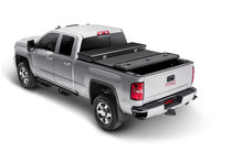 Cargar imagen en el visor de la galería, Extang 14-16 Chevy/GMC Silv/Sierra 1500 (6.5ft) / 14-16 2500/3500HD Solid Fold 2.0 Toolbox