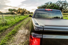 Cargar imagen en el visor de la galería, Roll-N-Lock 09-17 Dodge Ram 1500 XSB 67in A-Series Retractable Tonneau Cover