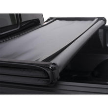 Cargar imagen en el visor de la galería, Lund 04-17 Nissan Titan (5.5ft. Bed w/Titan Box) Genesis Tri-Fold Tonneau Cover - Black