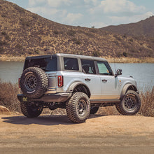 Cargar imagen en el visor de la galería, MagnaFlow 2021 Ford Bronco 2.3L I-4 Axle-Back Exhaust w/ Dual Split Rear Style Exit- Black Tips