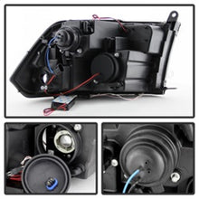 Load image into Gallery viewer, Spyder Dodge Ram 1500 09-14 Projector Halogen Model- CCFL Halo LED - Blk Smke PRO-YD-DR09-CCFL-BSM