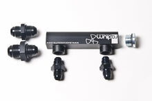 Cargar imagen en el visor de la galería, Radium Engineering Universal 4-Port Manifold - Black W/ Logo