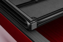 Cargar imagen en el visor de la galería, Lund 15-17 Chevy Colorado Fleetside (5ft. Bed) Hard Fold Tonneau Cover - Black