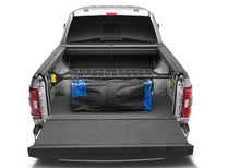 Load image into Gallery viewer, Roll-N-Lock 15-18 Ford F-150 XSB 65-5/8in Cargo Manager