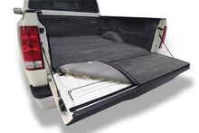 Cargar imagen en el visor de la galería, BedRug 04-15 Nissan Titan Crew Cab 5.5ft Bedliner