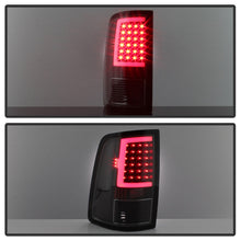 Cargar imagen en el visor de la galería, xTune 09-18 Dodge Ram 1500 LED Tail Lights - Black Smoke (ALT-ON-DR09-LBLED-BSM)