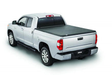 Cargar imagen en el visor de la galería, Tonno Pro 04-15 Nissan Titan 6.7ft (Incl 42-498 Utility Track Kit) Tonno Fold Tri-Fold Tonneau Cover