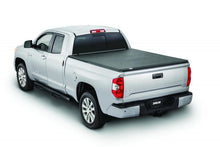 Cargar imagen en el visor de la galería, Tonno Pro 04-15 Nissan Titan 6.7ft (Incl 42-498 Utility Track Kit) Tonno Fold Tri-Fold Tonneau Cover