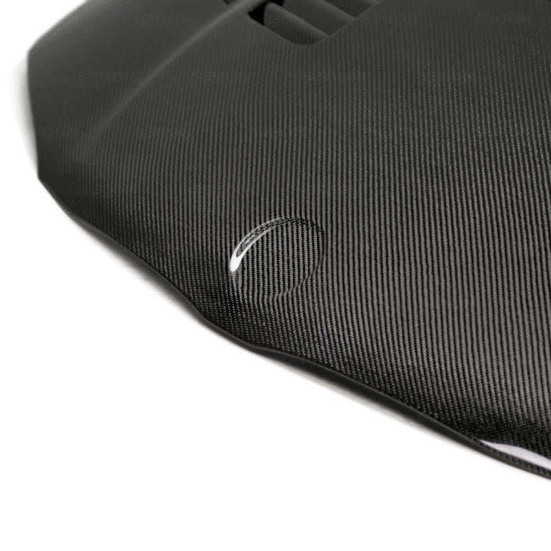 Seibon 08-11 BMW 1 Series (E81/E82) 2DR/HB GTR-Style Carbon Fiber Hood