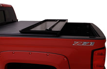 Load image into Gallery viewer, Lund 04-15 Nissan Titan (5.5ft. Bed) Hard Fold Tonneau Cover w/Bracket Kit - Black