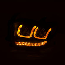 Load image into Gallery viewer, ANZO 14-18 Toyota Tundra w/ LED DRL Projector Headlights w/ U-Bar Switchback Black w/ DRL