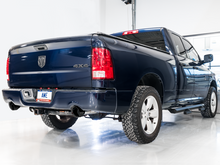 Cargar imagen en el visor de la galería, AWE Tuning 09-18 RAM 1500 5.7L (w/Cutouts) 0FG Dual Rear Exit Cat-Back Exhaust - Diamond Black Tips