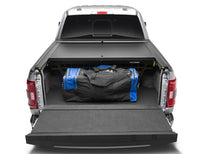 Cargar imagen en el visor de la galería, Roll-N-Lock 21-22 Ford F-150 (67.1in. Bed Length) Cargo Manager