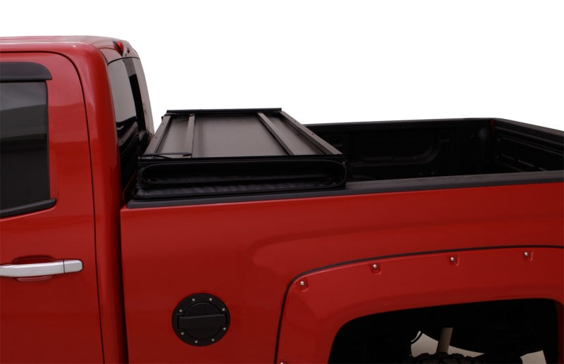 Lund 04-14 Chevy Colorado Styleside (5ft. Bed) Hard Fold Tonneau Cover - Black