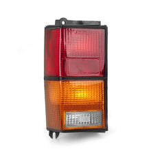 Cargar imagen en el visor de la galería, Omix Left Tail Lamp 84-96 Jeep Cherokee (XJ)