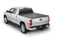 Cargar imagen en el visor de la galería, Tonno Pro 04-15 Nissan Titan 6.7ft (Incl 42-498 Utility Track Kit) Tonno Fold Tri-Fold Tonneau Cover