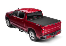 Load image into Gallery viewer, Roll-N-Lock 15-18 Chevy Silverado/Sierra 2500/3500 SB 77-3/8in M-Series Retractable Tonneau Cover