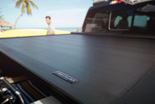 Cargar imagen en el visor de la galería, Roll-N-Lock 10-17 Dodge Ram 1500 - 3500 76in E-Series Retractable Tonneau Cover