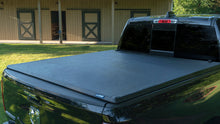 Load image into Gallery viewer, Lund 16-23 Nissan Titan XD (6.5ft. Bed w/o Titan Box) Genesis Tri-Fold Tonneau Cover - Black