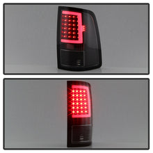 Cargar imagen en el visor de la galería, xTune 13-18 Dodge Ram 1500 LED Tail Lights - Black (ALT-ON-DRAM13V2-LBLED-BK)