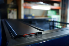 Cargar imagen en el visor de la galería, Roll-N-Lock 10-17 Dodge Ram 1500 - 3500 76in E-Series Retractable Tonneau Cover