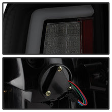 Cargar imagen en el visor de la galería, Spyder 13-14 Dodge Ram 1500 Light Bar LED Tail Lights - Black Smoke ALT-YD-DRAM13V2-LED-BSM