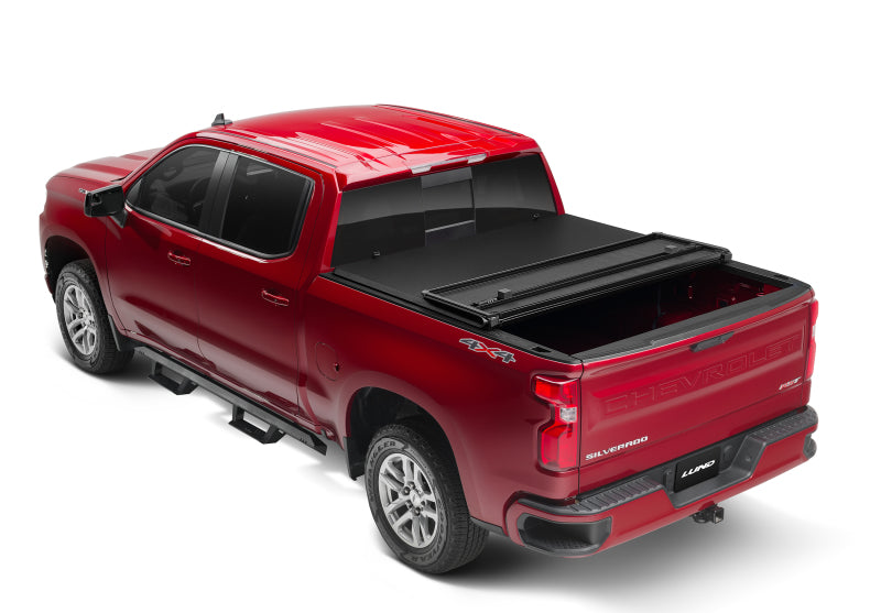 Lund 07-13 Chevy Silverado 1500 Fleetside (5.8ft. Bed) Hard Fold Tonneau Cover - Black